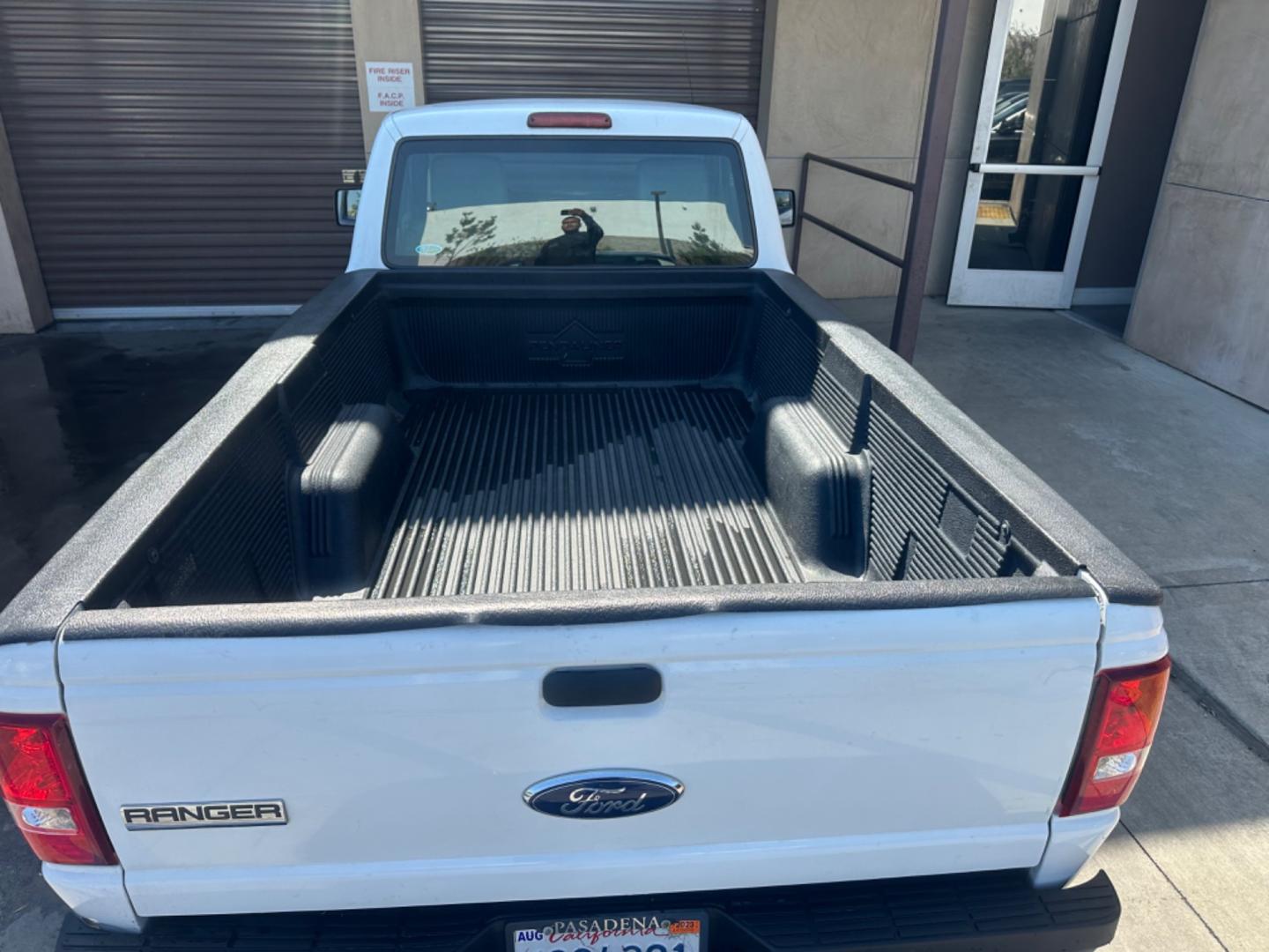 2011 WHITE /GRAY Ford Ranger XL 2WD (1FTKR1AE9BP) with an 4.0L V6 SOHC 12V engine, AUTOMATIC transmission, located at 30 S. Berkeley Avenue, Pasadena, CA, 91107, (626) 248-7567, 34.145447, -118.109398 - Body Style 2-Door REGULAR CAB PICKUP 2-DR Trim XL 2WD Engine 4.0L V6 SOHC 12V Other Transmission AUTOMATIC Drivetrain RWD Ext. Color WHITE Int. Color GRAY Stock Number 7662 VIN 1FTKR1AE9BPA78334 Location Crown City Motors Pasadena, CA WORK TRUCK!!! Crown City Motors is a use - Photo#15